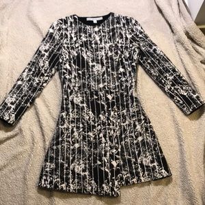 Unique mini dress with gold snap buttons